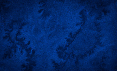 Fototapeta na wymiar Dark rich blue watercolor background with torn strokes and uneven divorces. Abstract background for design, layouts and patterns.