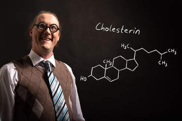 Professor presenting handdrawn chemical formula of Cholesterol
