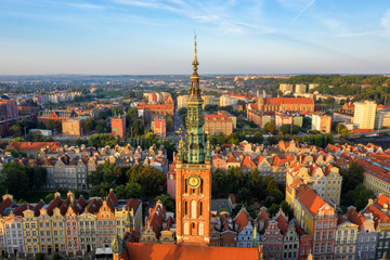 Obraz premium Gdansk is a city in Poland. Gdansk in the morning rays, the sun is reflected from the roofs of the old city.
