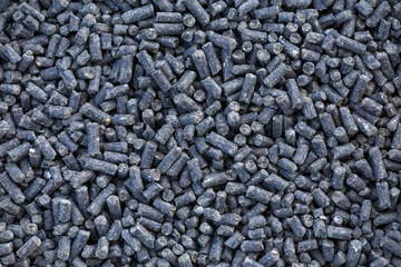 Chicken manure pellets or waste, organic fertilizer as background