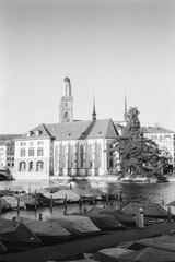 View of the Wasserkirche and the Limmat riverside in Zurich old town shot with analogue film...