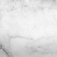 Obraz premium Silver watercolor background on white paper. Paint leaks and ombre effects. 