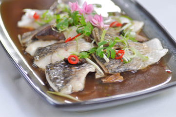 steamed fish, steamed striped bass or stewed fish