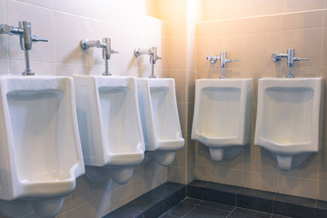 Urinals for men in the male bathroom