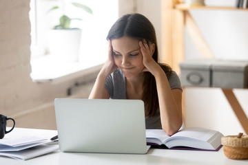 Bored girl student feel unmotivated studying at home