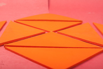 tiles orange on a red background