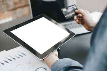 Mockup image of Beautiful woman holding credit card shopping online with tablet on online websites, mockup concept