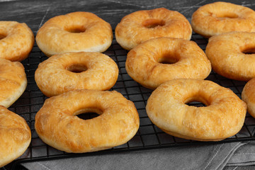 Homemade donuts on baking rack