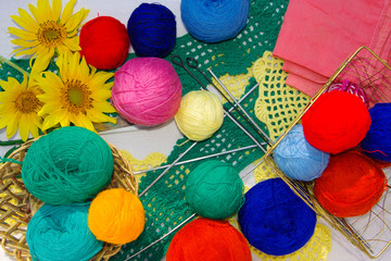 Balls of thread, knitting needles. Set for knitting.
