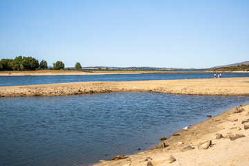 Manzanares el Real from the swamp with the mountains in the background
