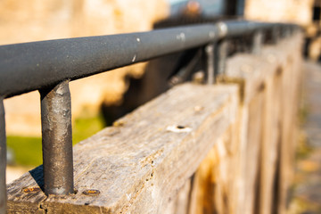 Metal railing on wooden structure