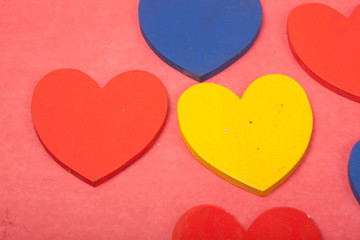 Obraz premium love colorful hearts on a red background