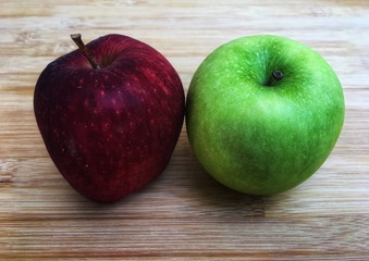 Freshness ripe green and red apple whole piece on wooden background