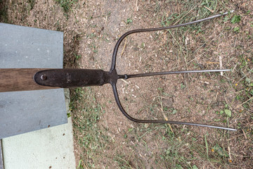 Obraz premium dung fork in front of a stable