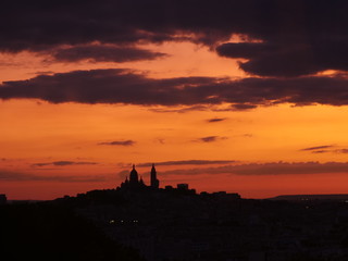 A sunset over Montmartre in Paris