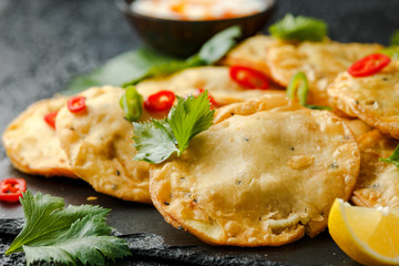 Traditional Indian snack food, chicken and vegetable staffing kachori