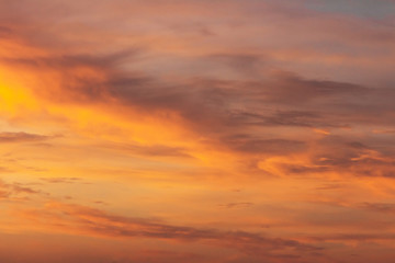Colorful dramatic sky at sunset with pasted clouds