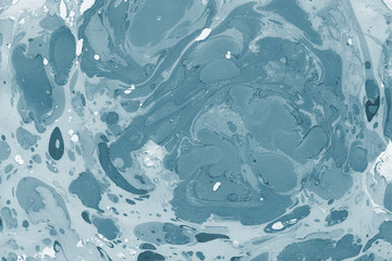 Bright blue marble ink paper textures on white background. Chaotic abstract organic design.	