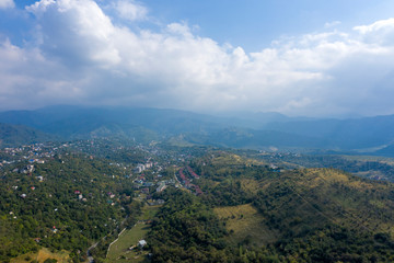 Fototapeta premium Almaty city from a bird's eye view. Foothills Of The TRANS-Ili Alatau. Kazakhstan. central Asia