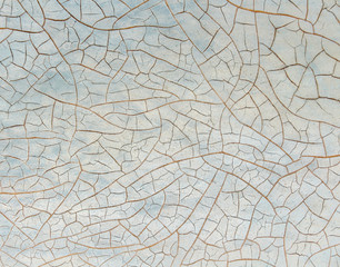 Cracked paint on wooden background, texture. Vintage wallpaper