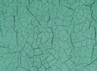 Cracked paint on wooden background, texture. Vintage wallpaper