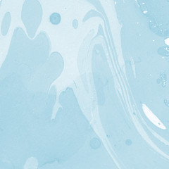 Blue marble ink texture with abstract washes and brush strokes on the white paper background.
