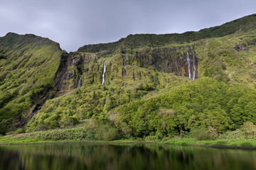 Landscape of Poço Ribeira do Ferreiro waterfalls and Lagoa dos Patos at Fajã Grande, Alagoinha on the fairy tale island of Ilha das Flores of the Azores