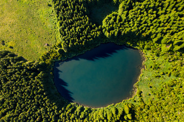 aerial top view of Lagoa Seca on Ilha do Pico Island, a volcanic caldeira crater in the Planalto da achada central plateau