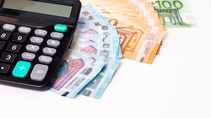 Loans and debts concept. Euro banknotes Laid out in a fan on white background. Money finance earning sector concept. Copy space for text. Stack of money wealth, lottery prizes or banking crise.