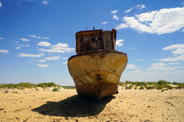 Rusting fishing boat on what was once the bottom of the Ara Sea, near Moynaq, Uzbekistan