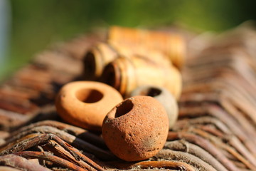 Clay leads and birch bark flouts from an old fishing net