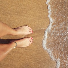 feet on the beach