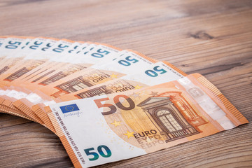 Euro banknotes. Selective focus on bank note number. 50 euro euro money. Money finance earning...