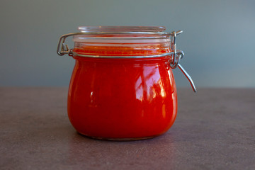 Glass with patent lid filled with homemade chili paste