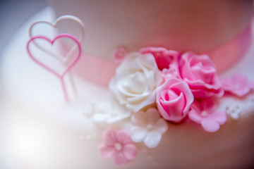 Fototapeta na wymiar Beautiful wedding cake, close up of cake and blur background
