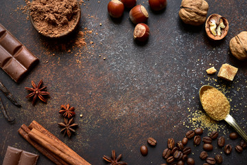Culinary background with ingredients for baking chocolate cookies or cake. Top view with copy space.