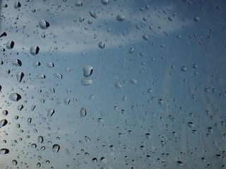 Water drop on glass window and rain condensation rainy storm season. Water drop on glass window background, rain condensation rainy storm season