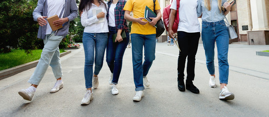 College students in high school campus walking during break