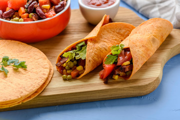 Tacos - delicious tortillas with meat and vegetables