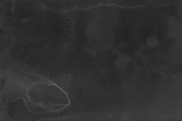 Black watercolor texture with abstract washes and brush strokes on the white paper background. Chaotic abstract organic design.