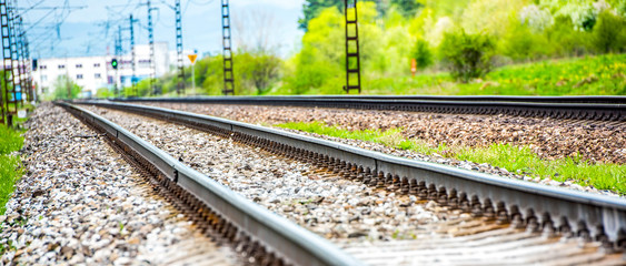Railroad track rails in coutry landspace