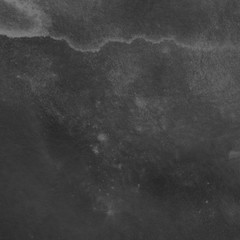 Black watercolor background on white paper. Paint leaks and ombre effects.	