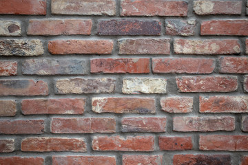Obraz premium Brick wall of red old brick front view