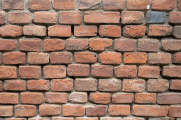 Old brickwork with crushed cement