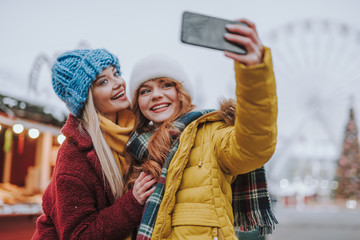 Positive delighted students looking at frontal camera