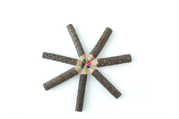 Seven colorful Rustic wooden color pencils in a star with white background