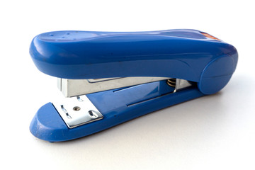 Blue stapler isolated on white background.