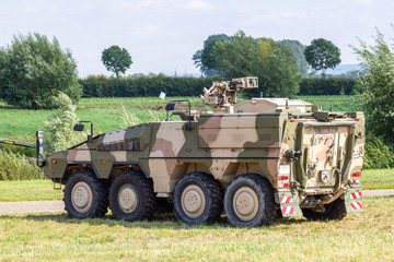 Armoured fighting vehicle, afv from german army stands on field