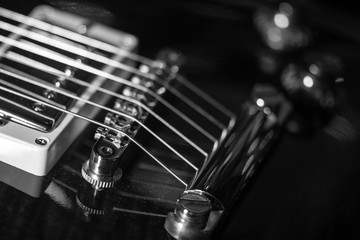 electric guitar, black & white, close-up