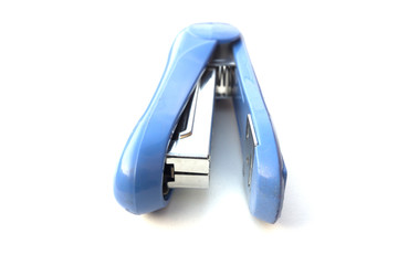 Blue stapler isolated on white background.